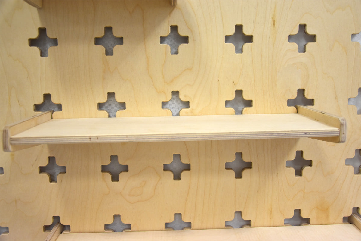 Hanging shelf for tool wall