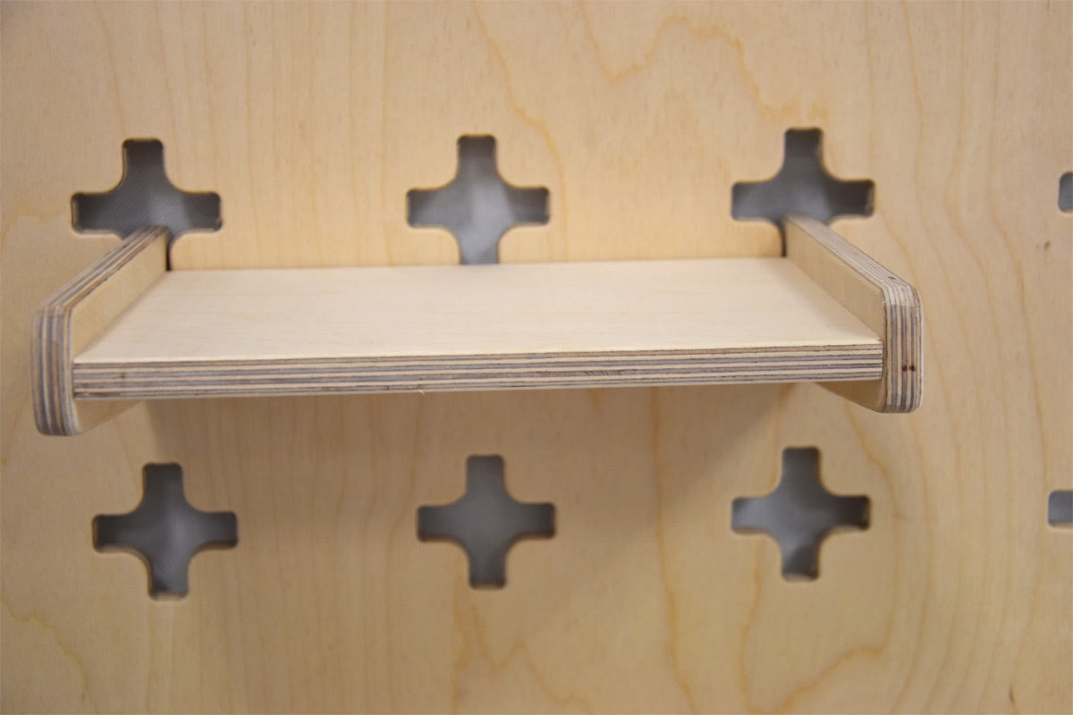 Hanging shelf for tool wall