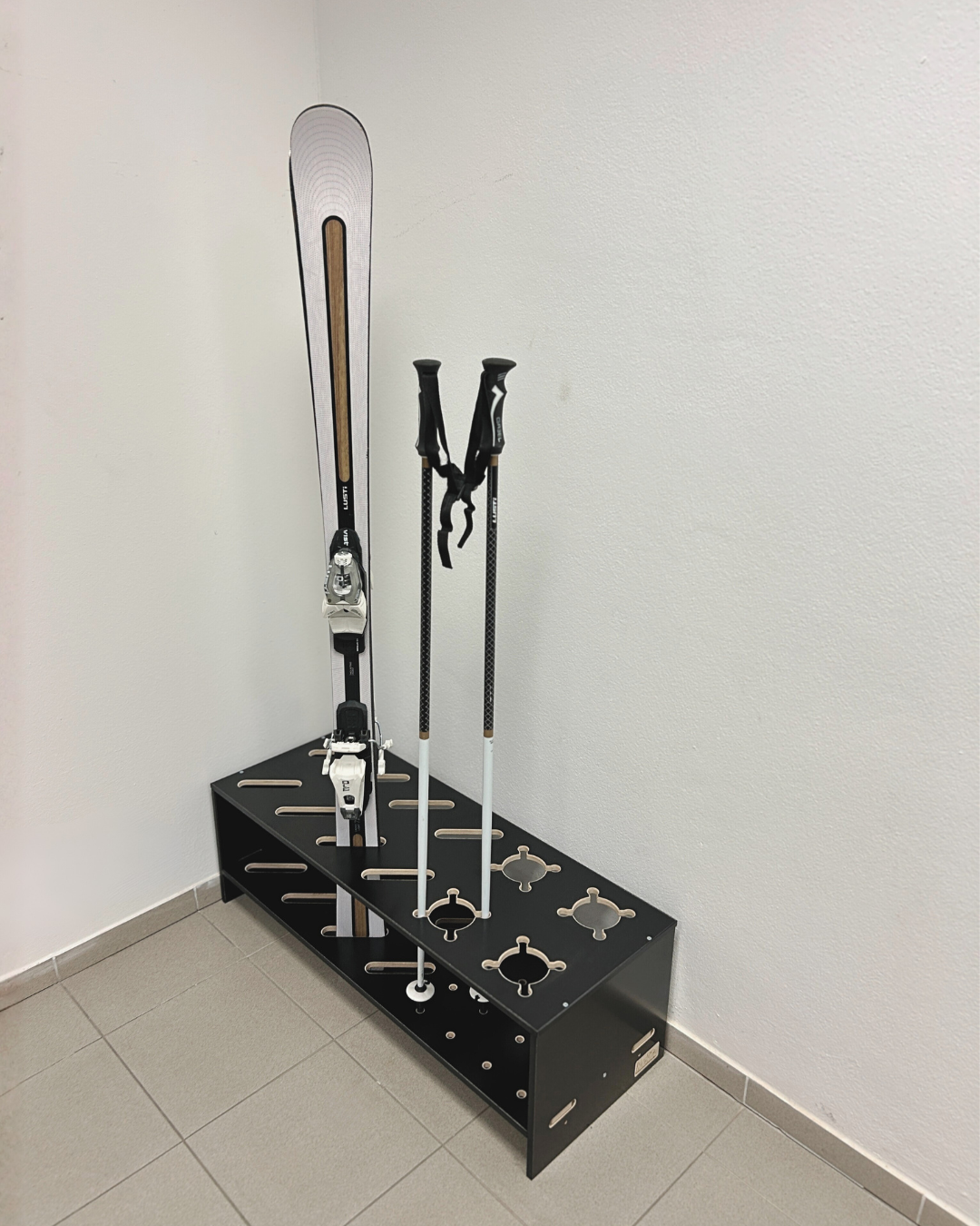 Combined wooden stand for skis and poles