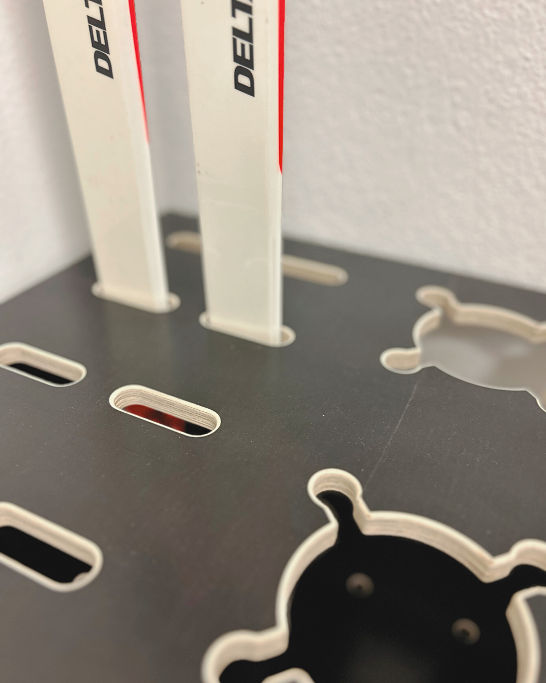 Combined wooden stand for alpine, cross‑country skis and poles