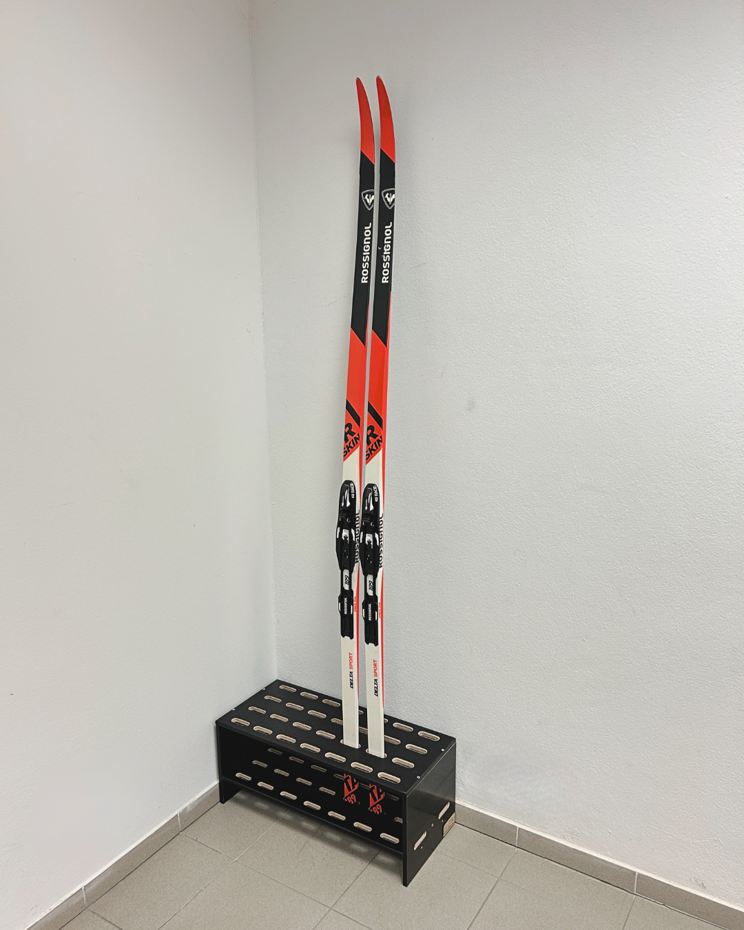 Wooden stand for 14 pairs of cross‑country skis