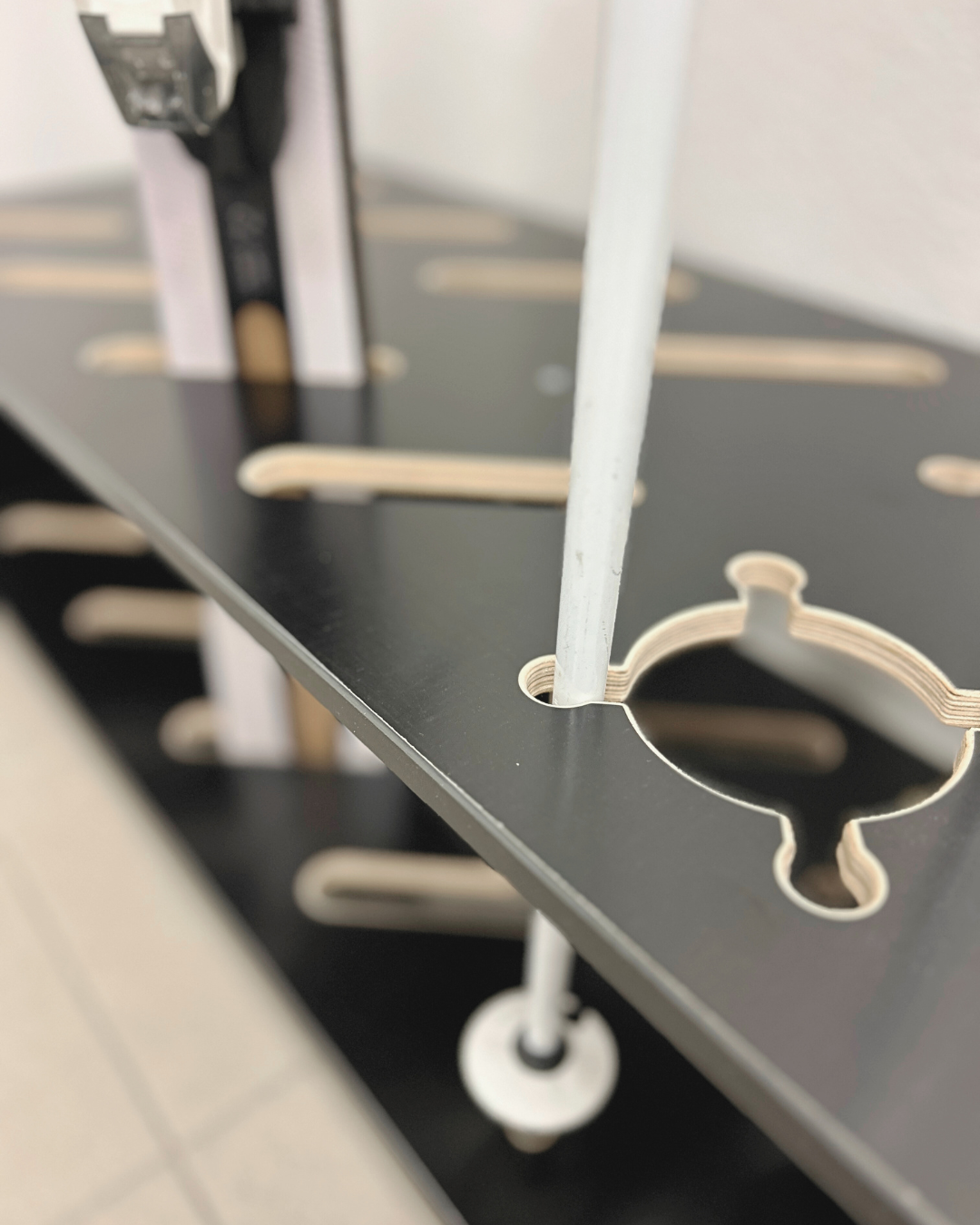 Combined wooden stand for skis and poles