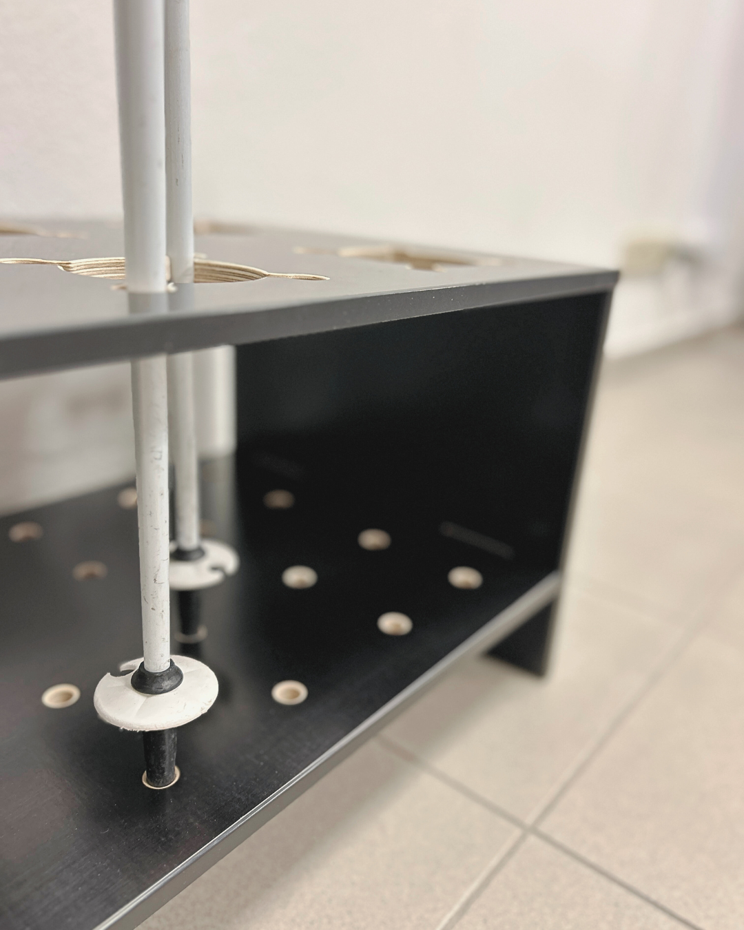 Combined wooden stand for skis and poles